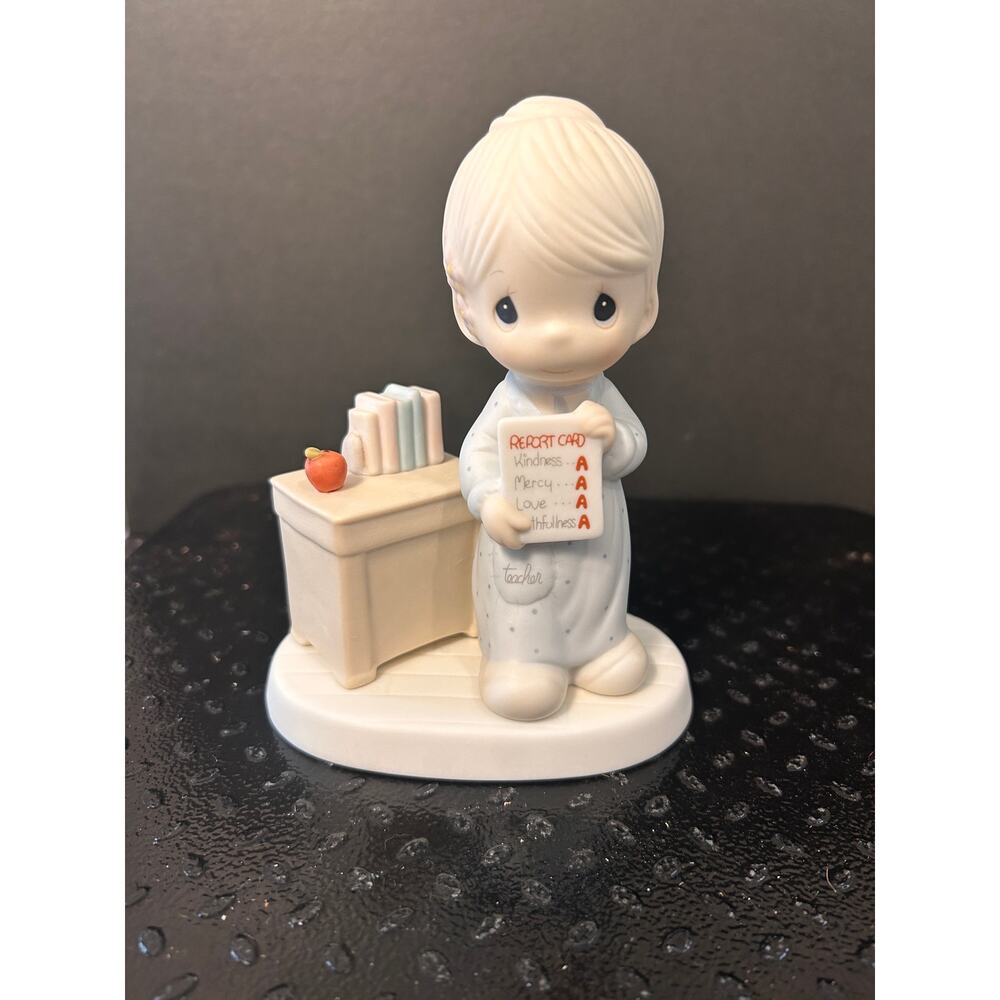 Precious Moments "Love Never Fails" porcelain figurine, model #12300